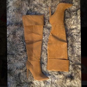 Knee high heeled boots